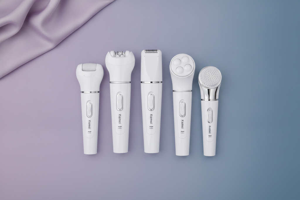 Flat lay of a Kemei 5-in-1 Beauty Tools Kit with multiple attachments, arranged on a slate blue and dusty lilac surface with 